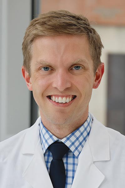Greg J. Eisinger, MD, MSSW