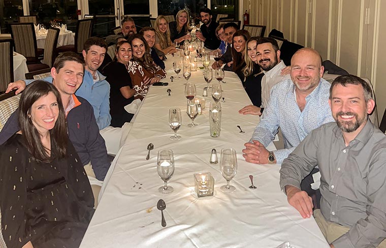 Pulmonology clinicians and spouses from Prisma Health gather for a team dinner during CHEST 2024 in Boston.
